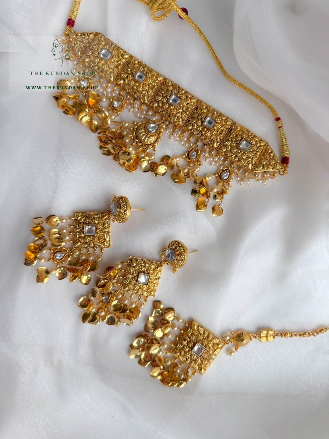 Implicate Pippal Patti in Golden Necklace Sets THE KUNDAN SHOP 