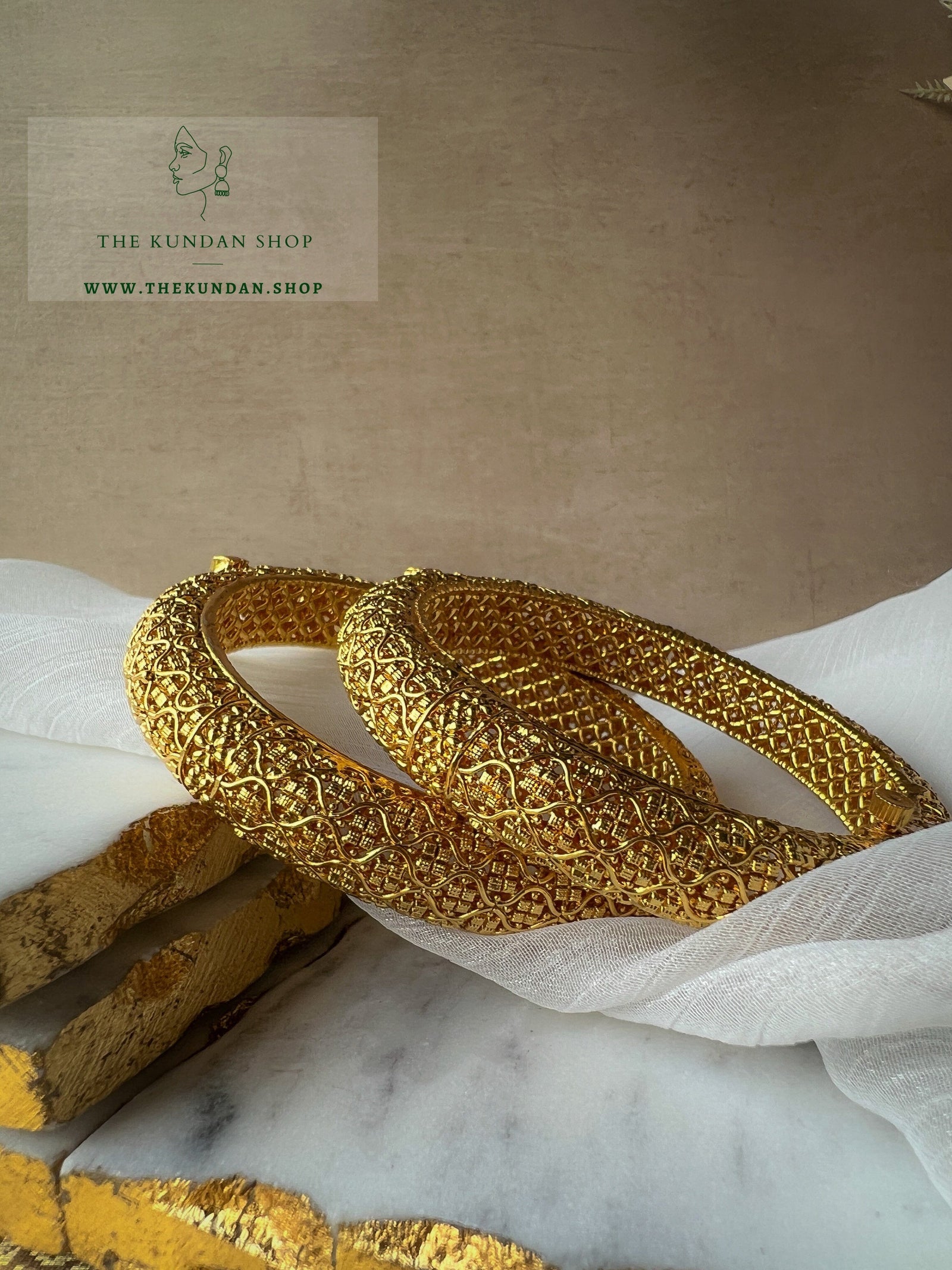 Pulling Strings in Gold Kangans Bangles THE KUNDAN SHOP 