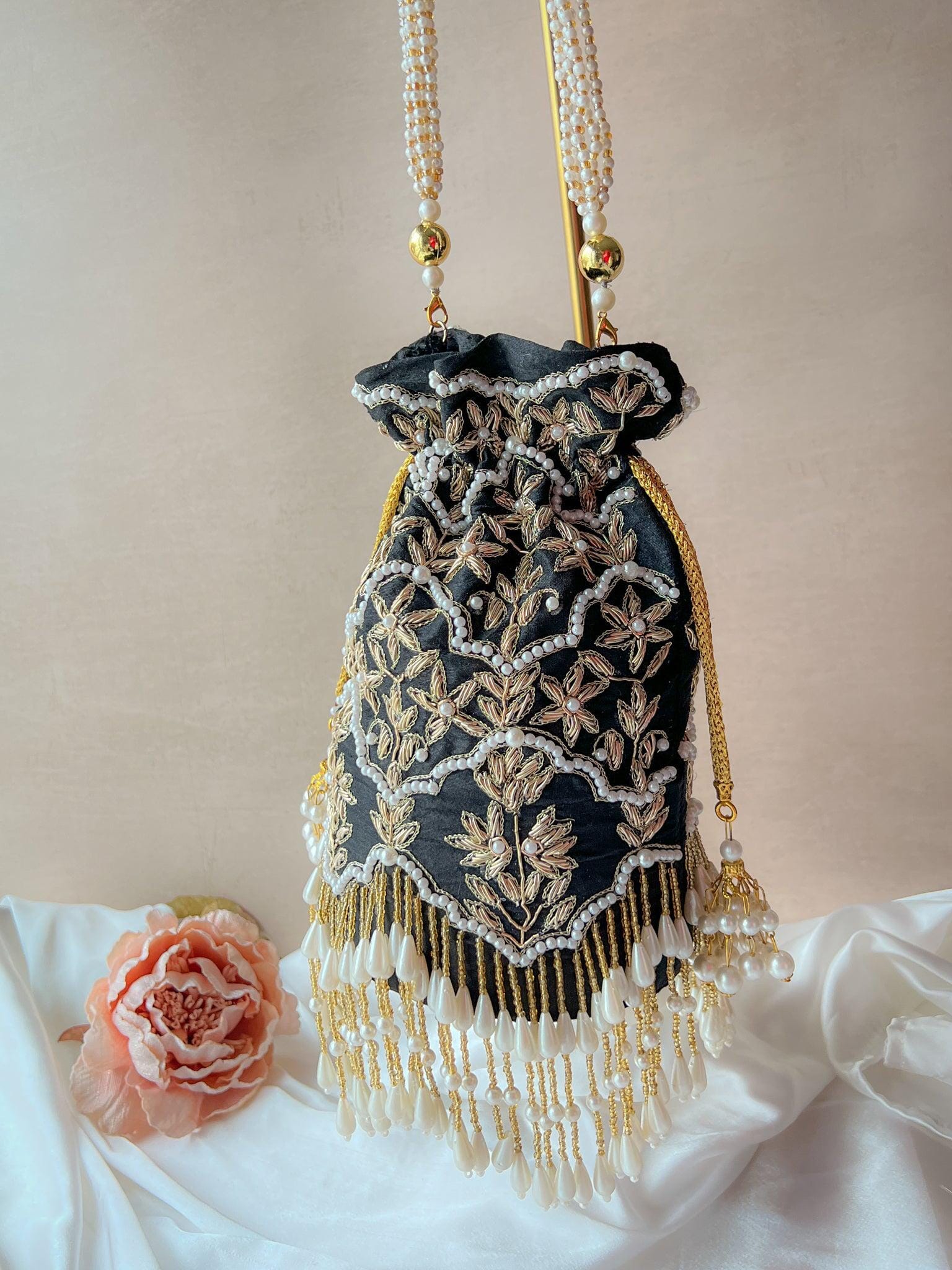 The Downfall Potli in Black Clutch THE KUNDAN SHOP 