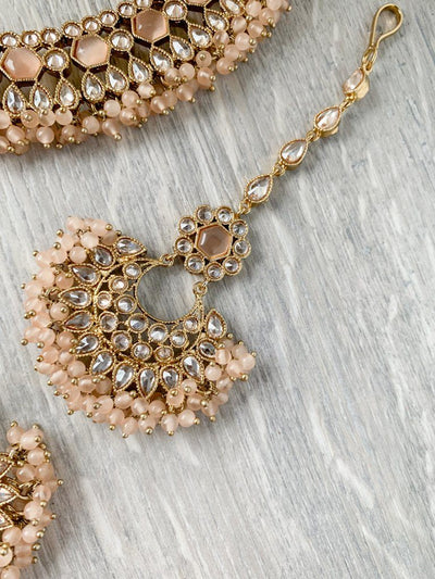 Reluctance in Light Peach Necklace Sets THE KUNDAN SHOP 
