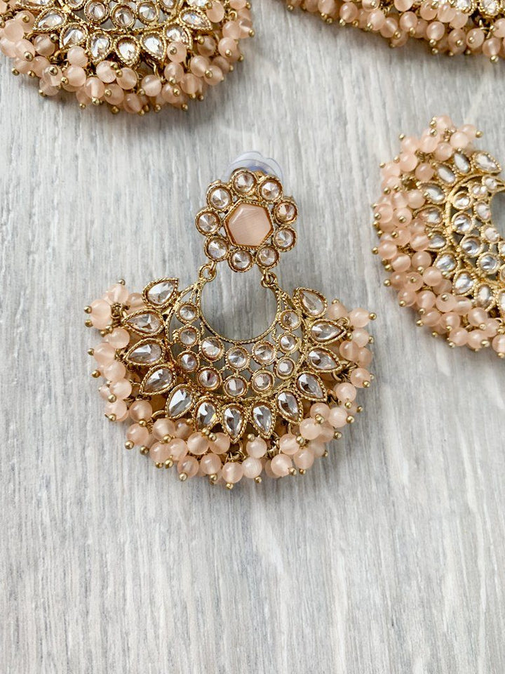 Reluctance in Light Peach Necklace Sets THE KUNDAN SHOP 