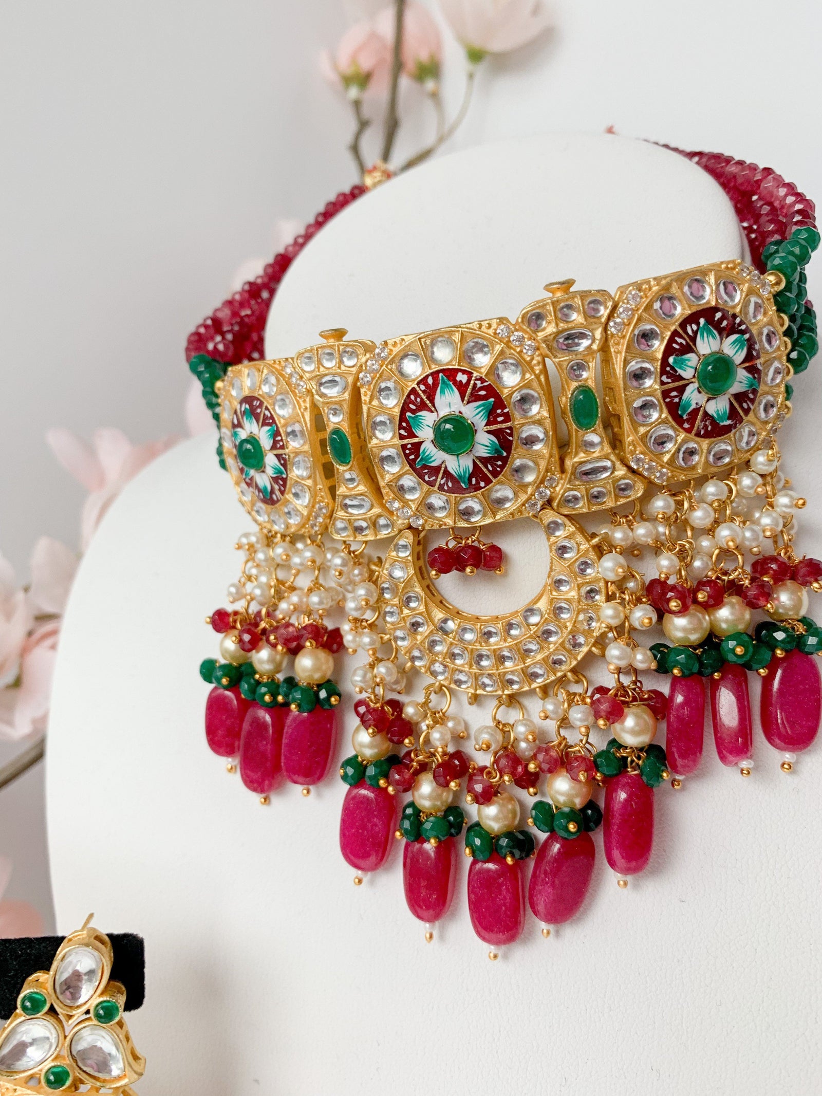 Resistance in Emerald & Ruby Necklace Sets THE KUNDAN SHOP 