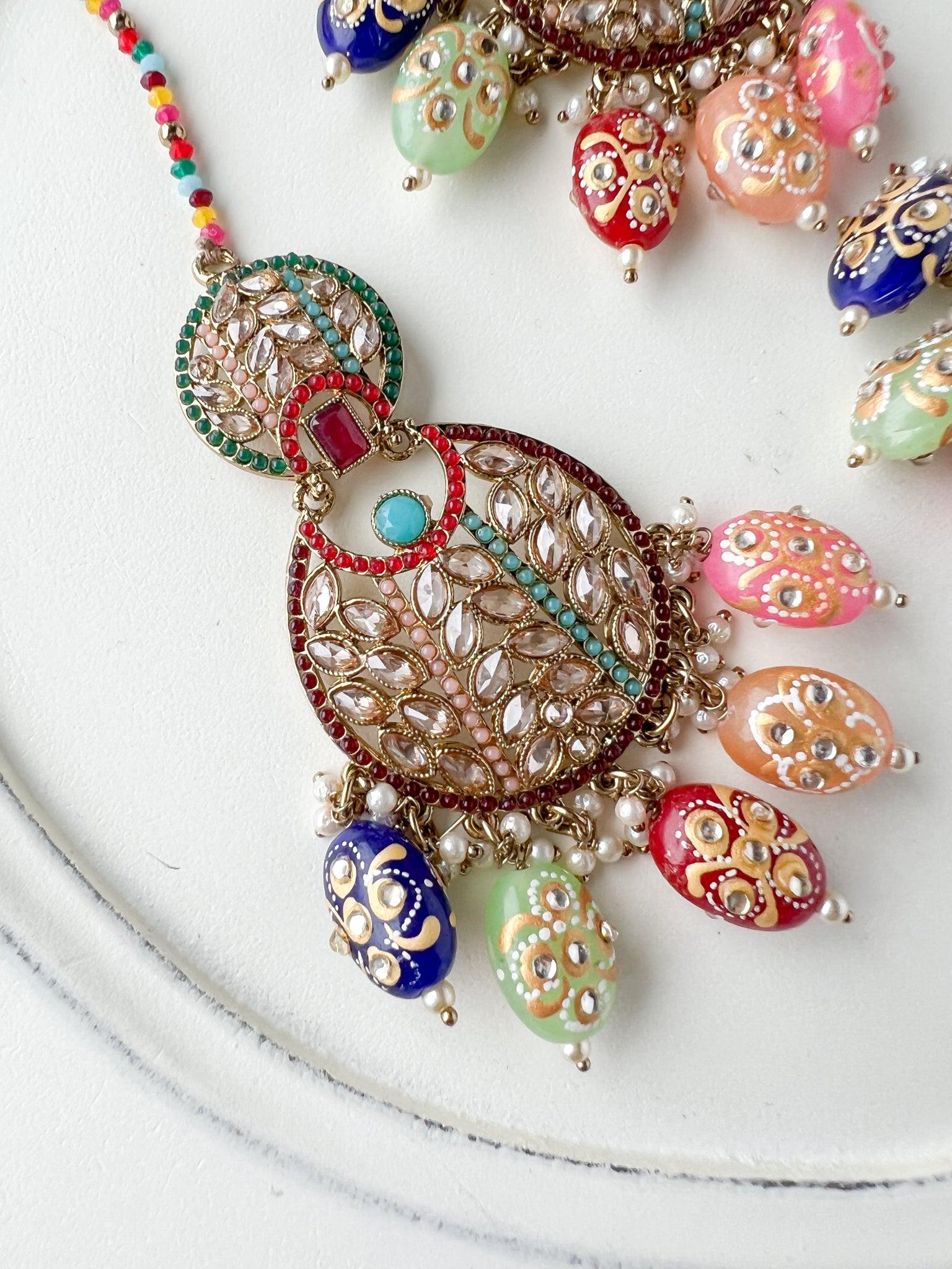 Whispers in Multi Earrings + Tikka THE KUNDAN SHOP 