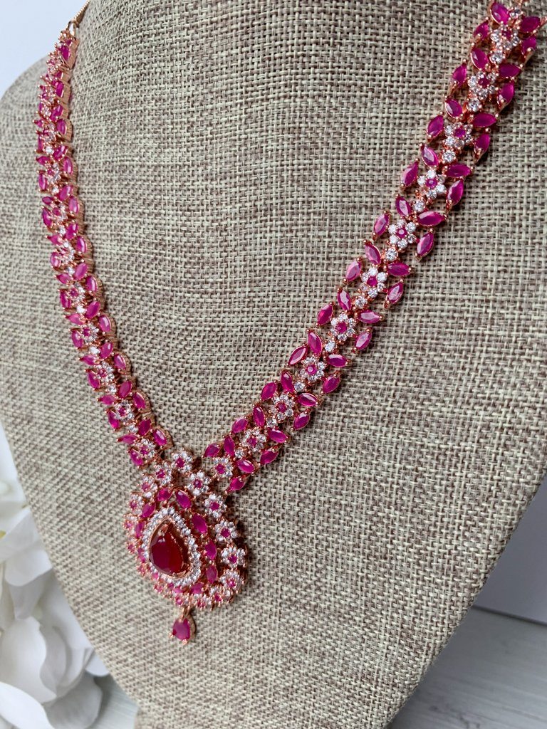 Favored Drops in Rose Gold & Ruby Necklace Sets THE KUNDAN SHOP 